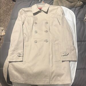 Coach Cream Trench Coat with Double-Breasted Style and Notched Lapel